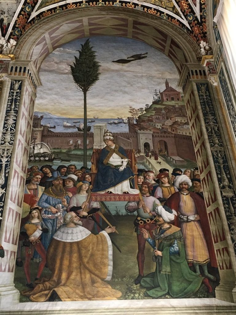 Metin Kutusu: İskenderiyeli Azize Catherine’in Münazarası’ndan bir kesit, Pinturicchio, 1492-1494. Duvar üzerine fresk, Papa’nın Sarayı (Vatikan), AppartamentoBorgia, Sala della Vita dei Santi