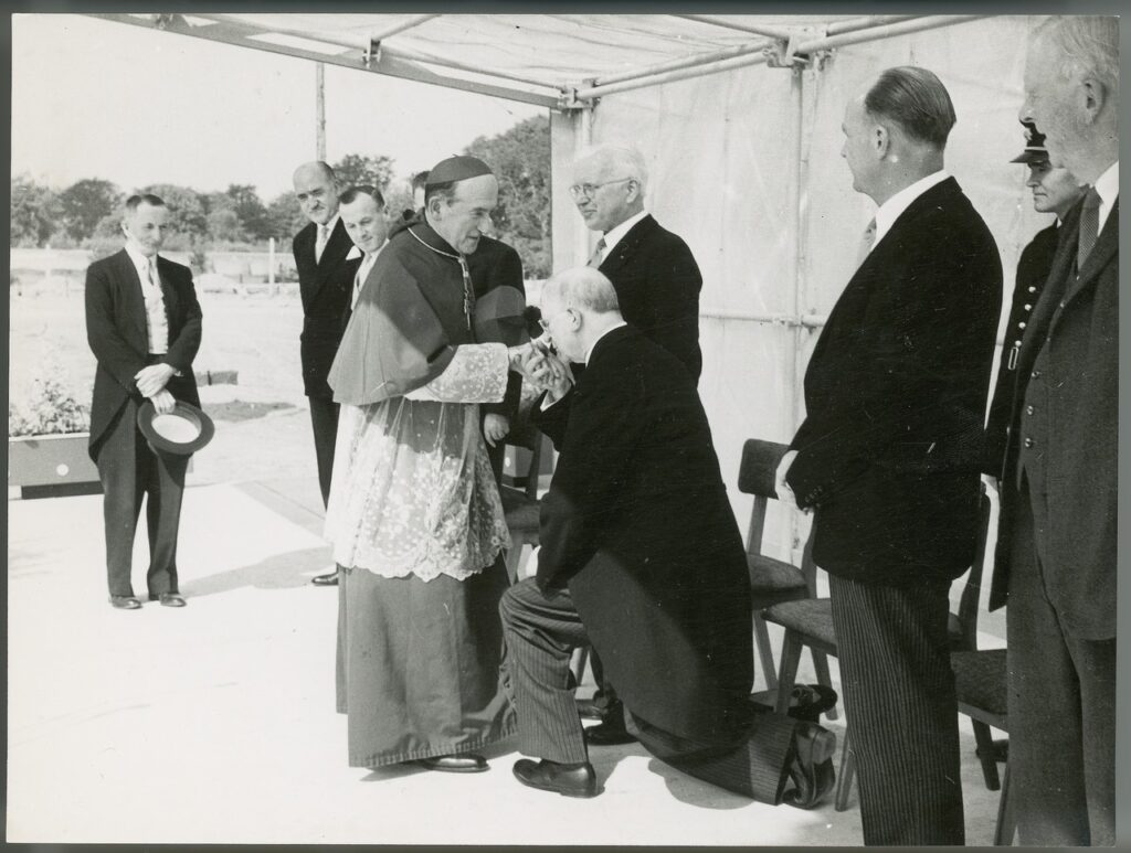 Photograph of President de Valera kissing the ring of Rev. Dr. John Charles  McQuaid Archbishop of Dublin.] - UCD Digital Library