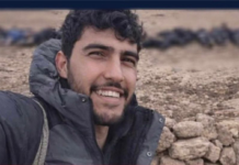 Kobani’de kurşuna dizilmiş 21 kişinin cesediyle gülerek video çekti. SDG: “İhraç ettik; silahlı güçlerdi” Şam: “Silahsız mahkumlar infaz edildi”