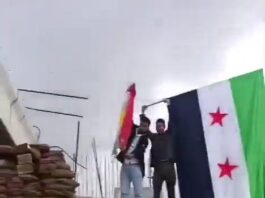 Suriye’de ilk resmi Newroz’da bayrak gerginliği. Sipan Hemo: “Suriye bayrağı bütün Suriyelileri temsil eder”