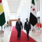 Şara Şam’da Barzani’yi dev Kürdistan bayrağıyla karşıladı